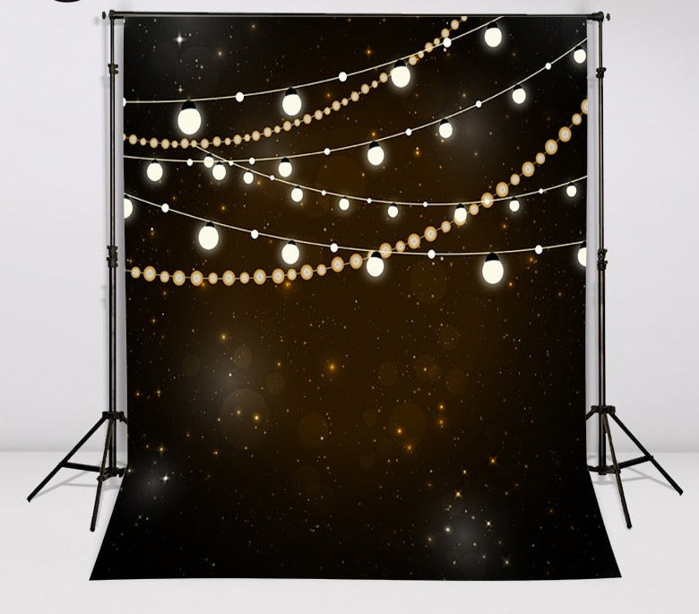 photography backdrops light bulb shining brightly stars void beautiful black Photo background 