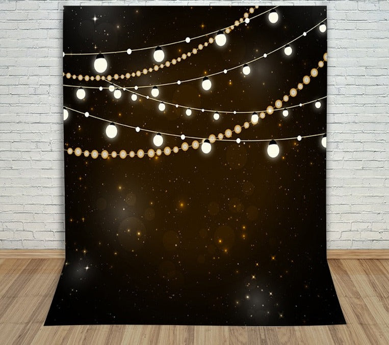 photography backdrops light bulb shining brightly stars void beautiful black Photo background 